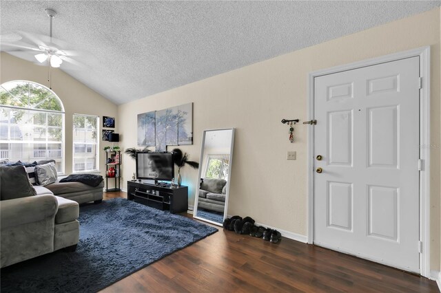 1025 S Hiawassee Rd Unit 2225, Orlando, FL 32835 - living area featuring a ceiling fan, a textured ceiling, lofted ceiling, and wood finished floors