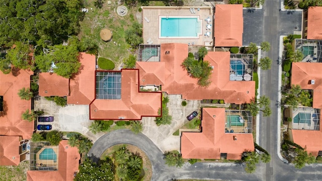 5015 Nassau Cir Unit 4, Orlando, FL 32808 - drone / aerial view of a pool area