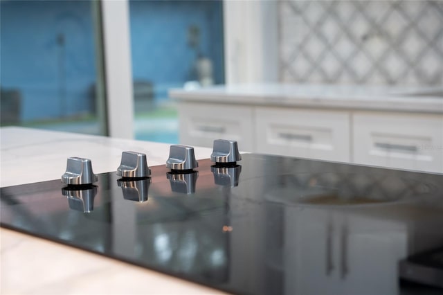 5015 Nassau Cir Unit 4, Orlando, FL 32808 - detailed view of black electric cooktop