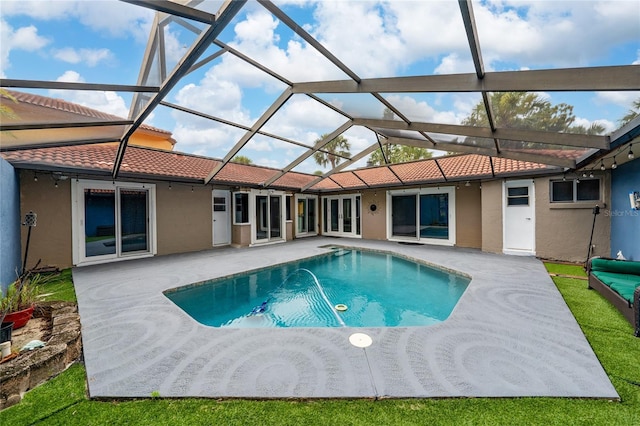 5015 Nassau Cir Unit 4, Orlando, FL 32808 - outdoor pool with a patio and glass enclosure