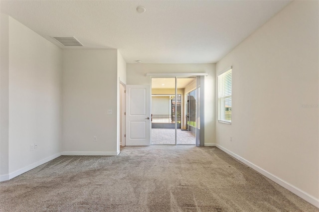 1101 Downswing Pl, Davenport, FL 33896 - carpeted spare room with baseboards