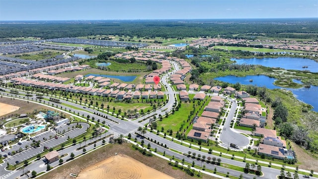 1101 Downswing Pl, Davenport, FL 33896 - aerial view of property and surrounding area with a nearby body of water and nearby suburban area