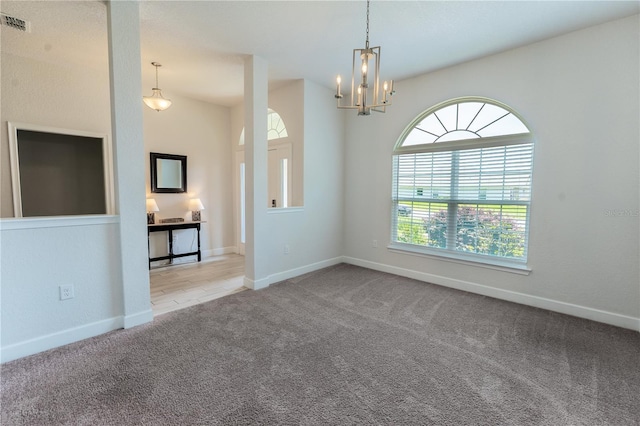 6644 SW 179th Court Rd, Dunnellon, FL 34432 - carpeted empty room featuring a chandelier and baseboards