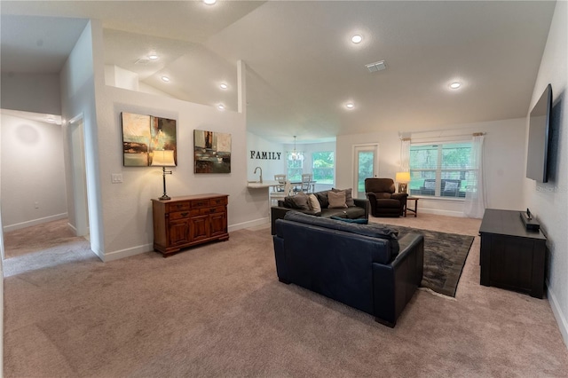6644 SW 179th Court Rd, Dunnellon, FL 34432 - living area featuring light carpet, baseboards, vaulted ceiling, and recessed lighting