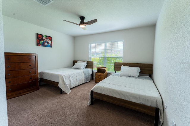 6644 SW 179th Court Rd, Dunnellon, FL 34432 - bedroom with carpet flooring, a ceiling fan, and a textured wall