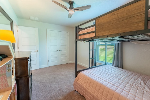6644 SW 179th Court Rd, Dunnellon, FL 34432 - bedroom featuring carpet floors, a closet, baseboards, and a ceiling fan