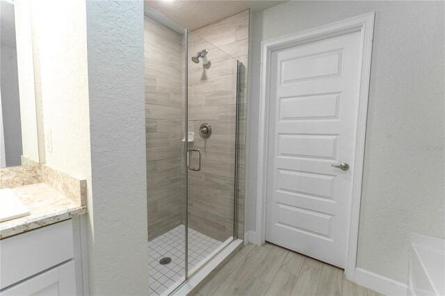 6644 SW 179th Court Rd, Dunnellon, FL 34432 - full bath with a stall shower, vanity, baseboards, and a bath
