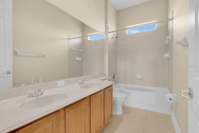 2255 Stone Lake Ct, Orlando, FL 32824 - bathroom featuring shower / bathtub combination, double vanity, and tile patterned floors