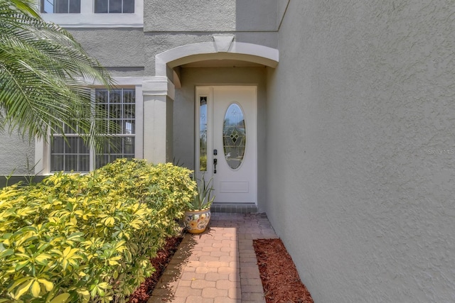 2255 Stone Lake Ct, Orlando, FL 32824 - entrance to property featuring stucco siding