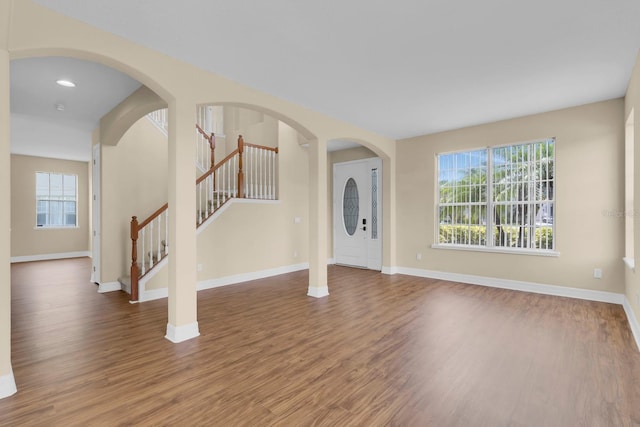 2255 Stone Lake Ct, Orlando, FL 32824 - entryway featuring wood finished floors, healthy amount of natural light, stairway, and recessed lighting