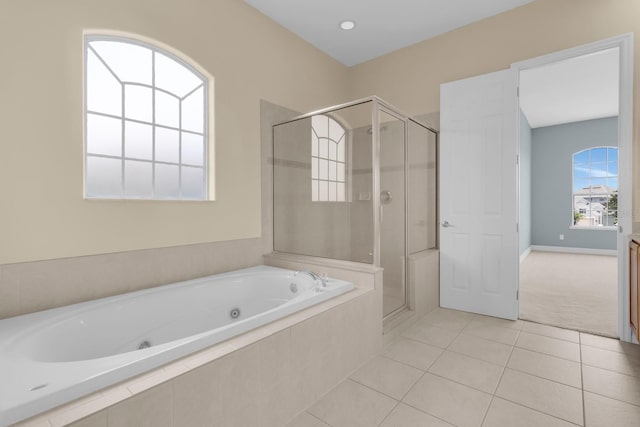 2255 Stone Lake Ct, Orlando, FL 32824 - full bathroom with a shower stall, a tub with jets, and tile patterned flooring