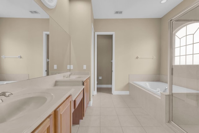 2255 Stone Lake Ct, Orlando, FL 32824 - bathroom featuring vanity, a bath, tile patterned floors, and a shower with shower door