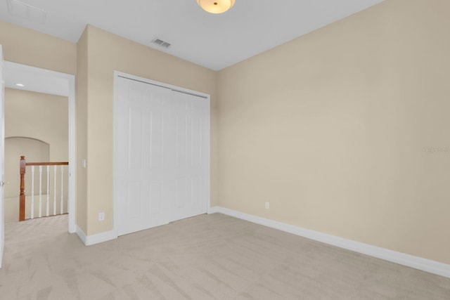 2255 Stone Lake Ct, Orlando, FL 32824 - unfurnished bedroom with light carpet and a closet