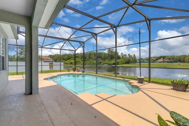 2255 Stone Lake Ct, Orlando, FL 32824 - outdoor pool with a patio, a water view, and glass enclosure