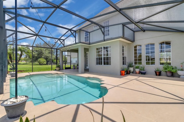 2255 Stone Lake Ct, Orlando, FL 32824 - swimming pool with a patio area and glass enclosure