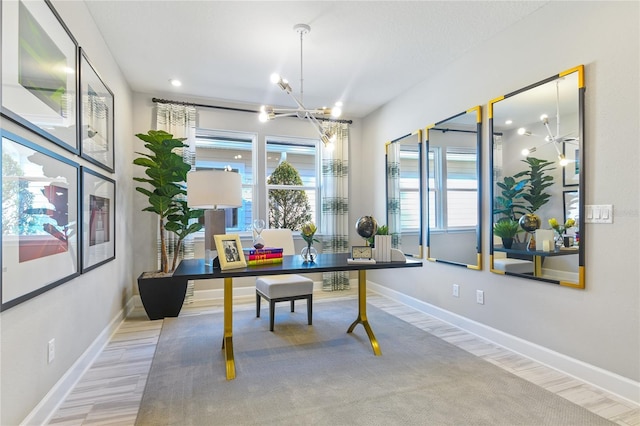 217 Thornberry Way, Palm Coast, FL 32164 - office area with a chandelier, plenty of natural light, and baseboards