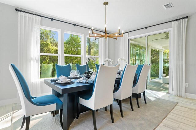 217 Thornberry Way, Palm Coast, FL 32164 - dining room with a chandelier