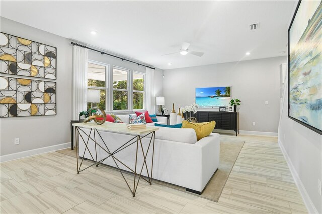 217 Thornberry Way, Palm Coast, FL 32164 - living room featuring ceiling fan, baseboards, and recessed lighting