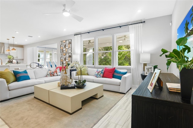 217 Thornberry Way, Palm Coast, FL 32164 - living room featuring ceiling fan and recessed lighting