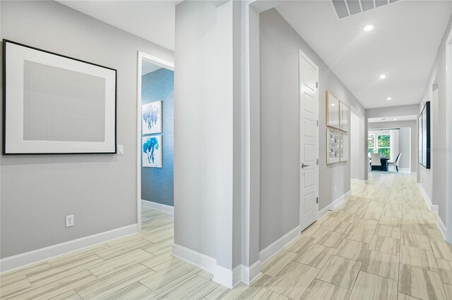 217 Thornberry Way, Palm Coast, FL 32164 - hall with baseboards and recessed lighting