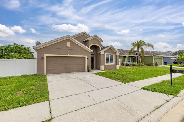 326 Highland Meadows Ave, Davenport, FL 33837 - single story home featuring stucco siding, an attached garage, and concrete driveway
