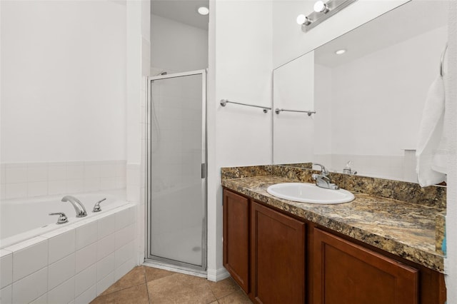 326 Highland Meadows Ave, Davenport, FL 33837 - bathroom featuring vanity, a shower stall, a bath, and tile patterned flooring