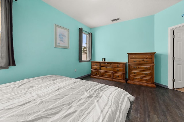326 Highland Meadows Ave, Davenport, FL 33837 - bedroom featuring dark wood-type flooring and baseboards