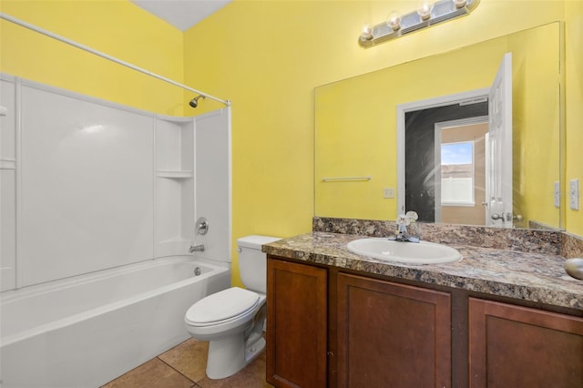 326 Highland Meadows Ave, Davenport, FL 33837 - full bath featuring toilet, vanity, shower / tub combination, and tile patterned floors