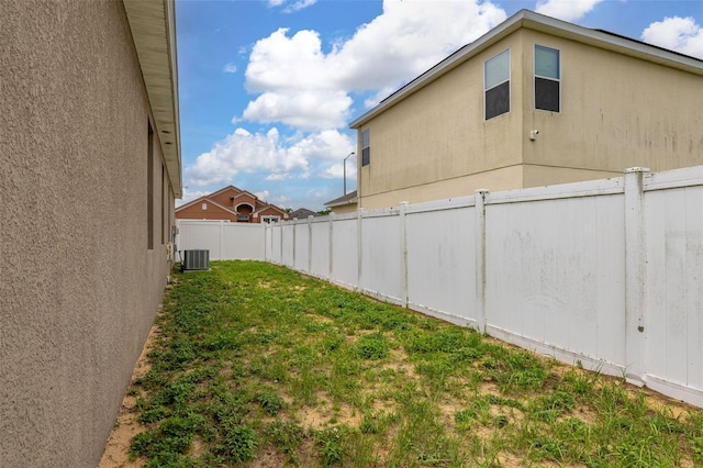 326 Highland Meadows Ave, Davenport, FL 33837 - view of yard featuring central AC unit