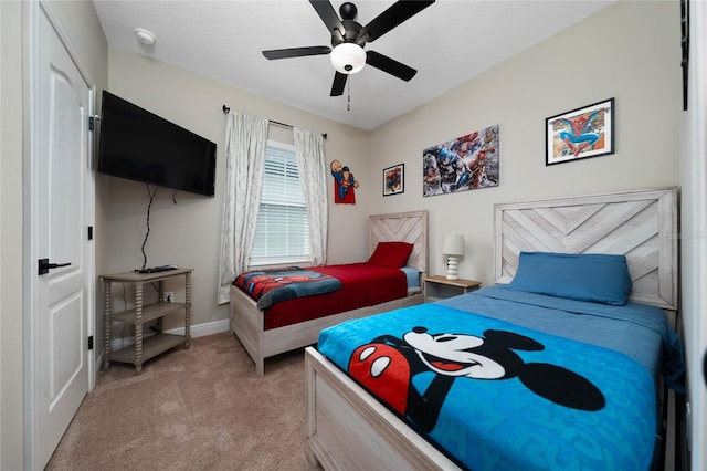 1335 Greenfield Loop, Kissimmee, FL 34747 - bedroom with carpet, baseboards, and a ceiling fan