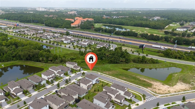 1335 Greenfield Loop, Kissimmee, FL 34747 - aerial view of property's location with a large body of water and nearby suburban area