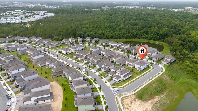 1335 Greenfield Loop, Kissimmee, FL 34747 - aerial overview of property's location with a heavily wooded area and nearby suburban area
