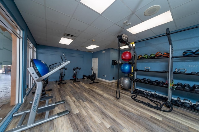 1335 Greenfield Loop, Kissimmee, FL 34747 - gym featuring wood finished floors and a drop ceiling