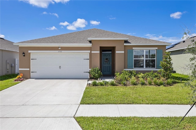1102 Tupelo Trl, Haines City, FL 33844 - ranch-style house with stucco siding, a garage, driveway, a front yard, and a shingled roof