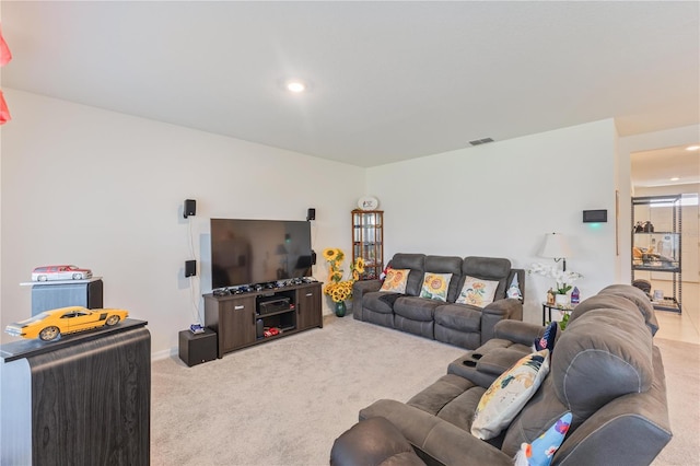1102 Tupelo Trl, Haines City, FL 33844 - living room featuring carpet floors and recessed lighting