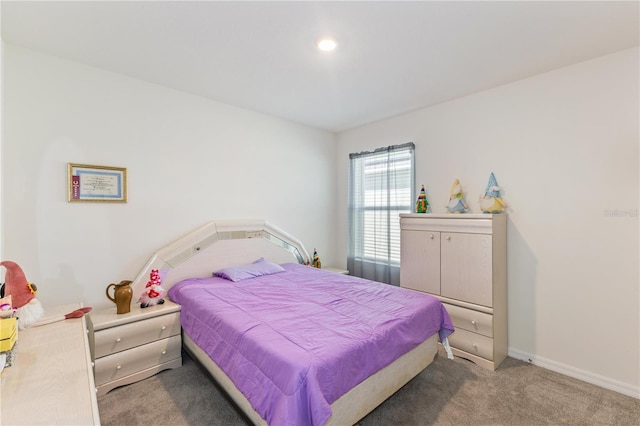 1102 Tupelo Trl, Haines City, FL 33844 - bedroom featuring light carpet and baseboards
