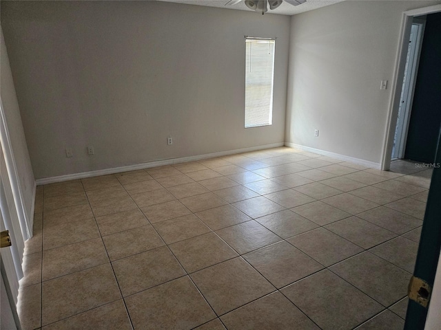 2805 Rodeo Dr, Kissimmee, FL 34746 - unfurnished room featuring a ceiling fan, light tile patterned floors, and baseboards