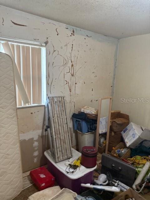4339 Solomon Dr, Orlando, FL 32811 - misc room with a textured ceiling