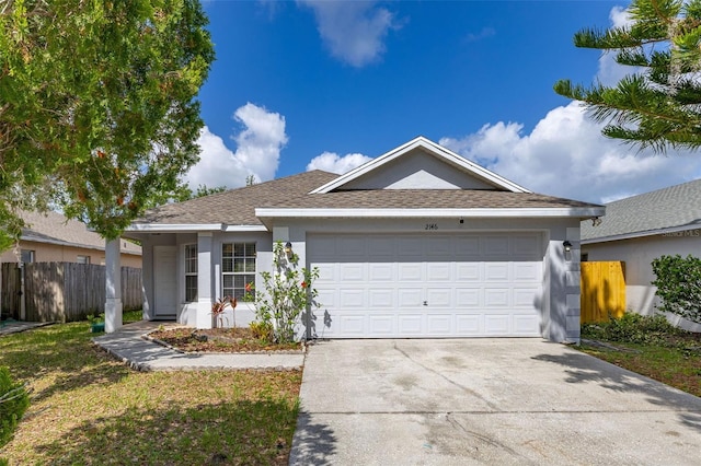 2146 Fish Eagle St, Clermont, FL 34714 - single story home with driveway, a garage, stucco siding, and roof with shingles