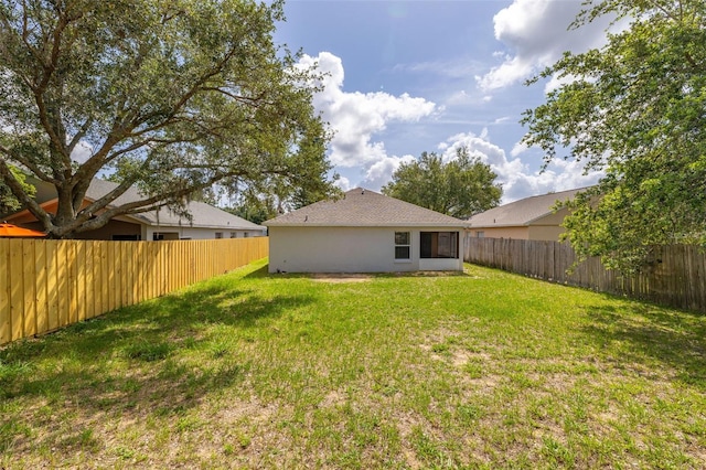 2146 Fish Eagle St, Clermont, FL 34714 - back of house featuring stucco siding