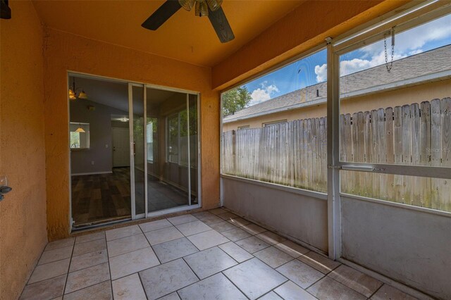 2146 Fish Eagle St, Clermont, FL 34714 - unfurnished sunroom featuring ceiling fan