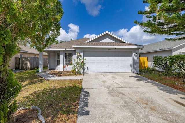 2146 Fish Eagle St, Clermont, FL 34714 - ranch-style home featuring an attached garage, driveway, and stucco siding