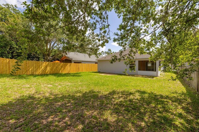 2146 Fish Eagle St, Clermont, FL 34714 - view of yard with a sunroom