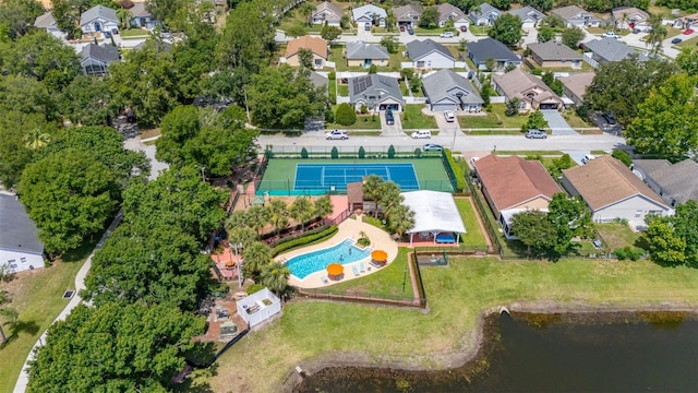 2146 Fish Eagle St, Clermont, FL 34714 - aerial overview of property's location featuring a pool area, nearby suburban area, and a nearby body of water