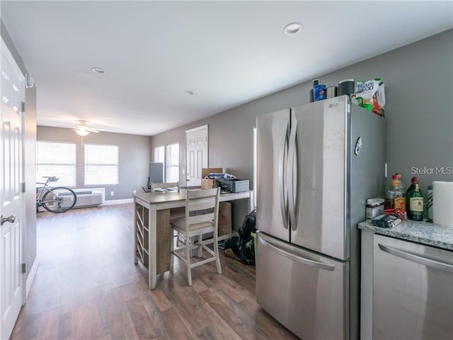 405 Eron Way Unit 39, Winter Garden, FL 34787 - kitchen with stainless steel appliances, wood finished floors, an office area, recessed lighting, and a ceiling fan