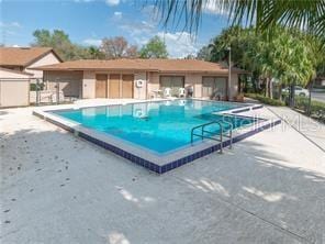 405 Eron Way Unit 39, Winter Garden, FL 34787 - community pool featuring a patio
