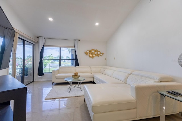 121 White Birch Dr, Kissimmee, FL 34743 - living area with recessed lighting, vaulted ceiling, and tile patterned flooring