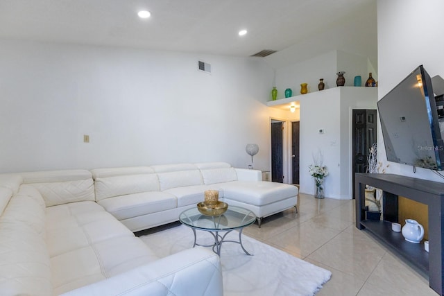 121 White Birch Dr, Kissimmee, FL 34743 - living room with high vaulted ceiling, light tile patterned flooring, and recessed lighting