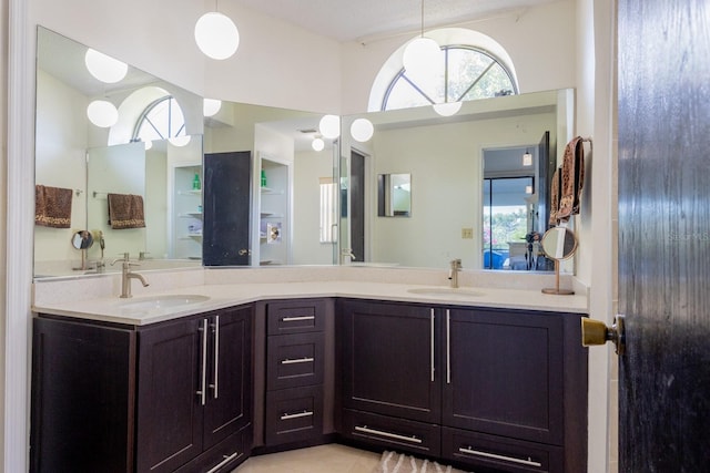 121 White Birch Dr, Kissimmee, FL 34743 - bathroom with double vanity and tile patterned floors