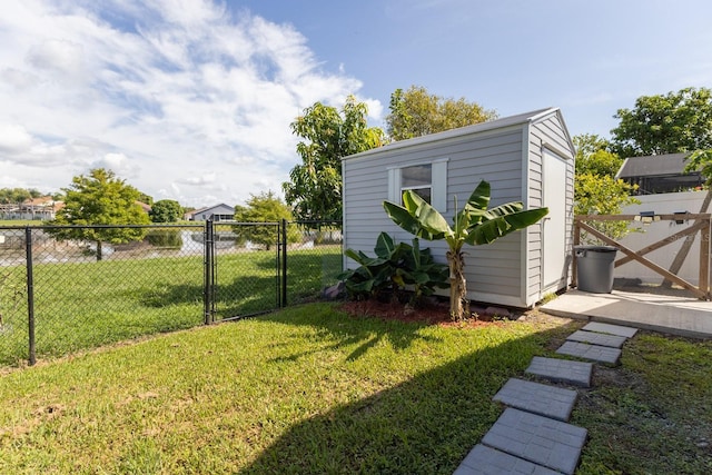 121 White Birch Dr, Kissimmee, FL 34743 - view of yard with a gate and a shed